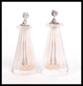 A pair of vintage 20th century silver and cut glass cayenne or snuff bottles having Devil heads to