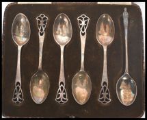 A group of silver hallmarked teaspoons to include a set of five Walker and Hall, Sheffield assay