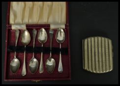 A cased set of 20th century silver hallmarked tea spoons by A J Bailey bearing Birmingham assay