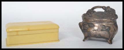 A stunning early 20th century silver plated trinket pot in the Art Nouveau manner together with