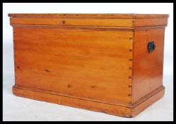 A good 19th century pine cabinet makers trunk - chest. Pine panelled body with hinged top opening to