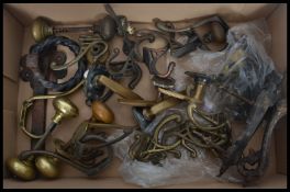 A collection of antique architectural door furniture to include knobs ,  escutcheons set of art deco