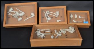 A collection of unusual clay pipes to include unusual examples such as Church Wardens etc, some with