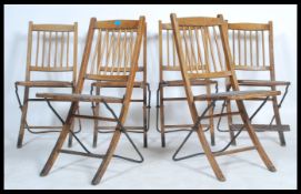 Davista - A set of 1920's early 20th century industrial oak folding chapel / hall chairs. The chairs