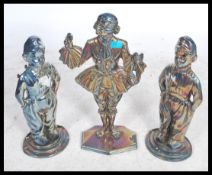 A pair of large cast metal lustre fireside companions / door stops in the form of Dutch Boys and a