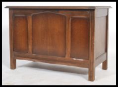 A 19th century Victorian oak coffer chest blanket box raised on square legs. The hinged lid