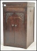 An Edwardian mahogany box pedestal gramaphone cabi