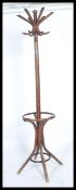 A Victorian 19th century Thonet bentwood hatstand of large form with shaped hooks to top, and