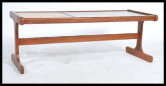 A 1970's retro G-Plan tiled and glass top coffee table of rectangular form with inset retro tiles