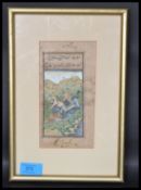 A 19th century Persian miniature of two warriors mounting on an elephant spearing man to death,