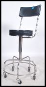 A good mid century /- 1970's Industrial medical surgeons theatre stool. Polished chrome construction
