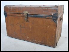 An early 20th century vintage grained tin / tack trunk with lock to front with fitted hinged top