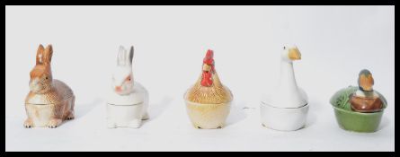 A group of five Michel Caugant French ceramic croc / pate tureens in the form of wildlife. Including