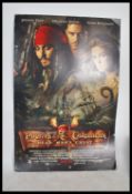 A 20th century large Pirates Of The Caribbean film cinema poster ' Dead Man's Chest ' Starrting