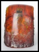 An unusual 20th century cicada cricket encased within an amber type resin. Measures 11 cm high.