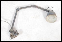 A 1950's mid century Industrial anglepoise factory work lamp light. The desk light with pendant