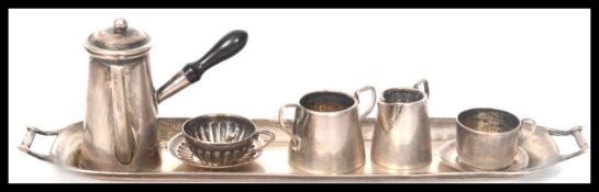 A stunning Edwardian silver hallmarked miniature coffee service by Cornelius Desormeaux Saunders &