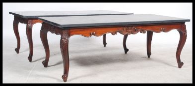 A pair of contemporary upcycled Industrial style coffee tables having large black slate table tops