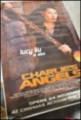 A collection of large cinema film advertising post