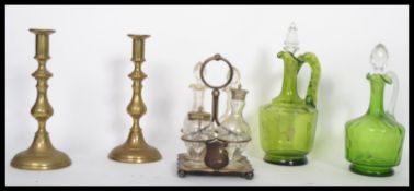 Two 19th century green glass hand blown decanters together with a cut glass condiment set with