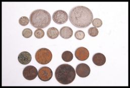 A group of vintage bank notes and silver coins dating from the 18th century. Coins to include George