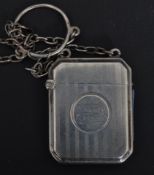 An early 20th century George V vesta case of octagonal form having an engine turned decoration