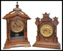 Two vintage early 20th century mantel clocks, both set with eight day movements and retaining