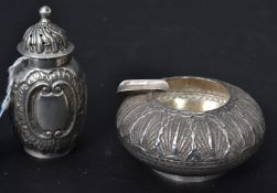A 19th century silver hallmarked Victorian sugar shaker / condiment pepperette salt / pepper pot