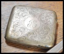 A collection of silver  items to include a silver hallmarked cigarette case, a dressing table mirror