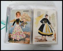 KITSCH postcards. Collection (41) of Embroidered costume cards mostly Spanish ladies.Despite the
