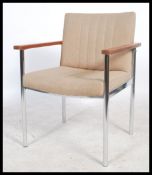 A retro 1960's teak and chrome desk office chair. Raised on chrome tubular metal frames with wool