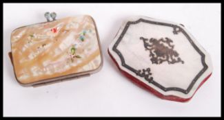 A 19th century Victorian mother of pearl ladies purse, with scrolling armorial silver inlay and