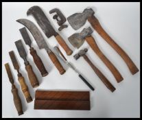 A group of vintage 20th century tools to include Bilhook's Axes, hammer , chisels , etc. Please