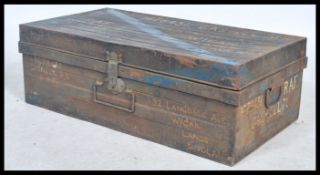 A vintage mid 20th century ebonised military metal steamer trunk. Notation to the top reading