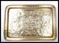 A 19th century Indian Raj period brass tray of rectangular form having geometric patterns with a