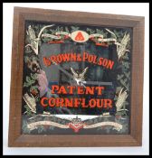 A vintage 20th century Brown & Polson advertising point of sale mirror being converted into a clock.