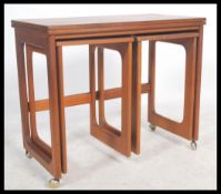 A retro teak wood 20th century McIntosh of Kirkcaldy Triform teak trolley nest of tables having a