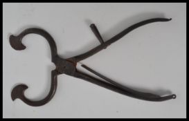 A pair of 19th century cast iron Georgian sugar cutters / nips. Measures 24 cm long.