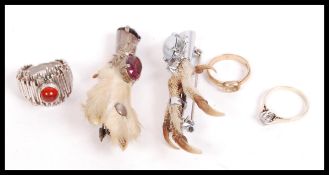 A group of vintage jewellery to include two Scottish kilt brooches one set with amethyst and the