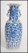 A 19th century Chinese ceramic vase having twin dr