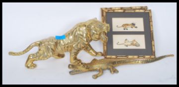 A pair of framed and glazed signed in pencil prints of playful Tigers by Vivienne St Clair