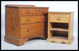 An antique style pine country cottage chest of drawers having 2 short drawers over deep drawers