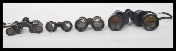 A set of three vintage retro binoculars and a pair of opera glasses in cases, brand to include