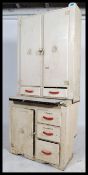 A mid 20th century painted pine kitchen work unit storage cupboard having a painted white finish