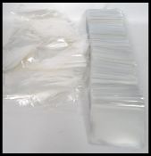 Postcard sleeves. Approx shoebox full of mostly small size and quantity of same size polythene