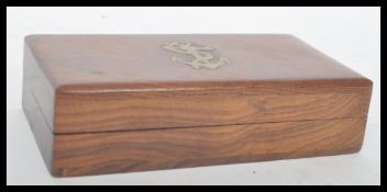 A contemporary cased brass nautical ships calendar paperweight and time zone calculator