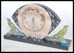 An early 20th century 1930's  Art Deco Verdigris mantel clock raised on a marble base with painted