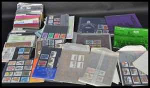 A collection of British Post Office Mint Stamps to include several diffent packs ranging from Dogs