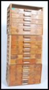 A mid century scratchbuilt Industrial pedestal cabinet having multiple drawers with decorative