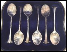 A rare set of six early 20th century silver hallmarked shell pattern tea spoons by  William Hutton &